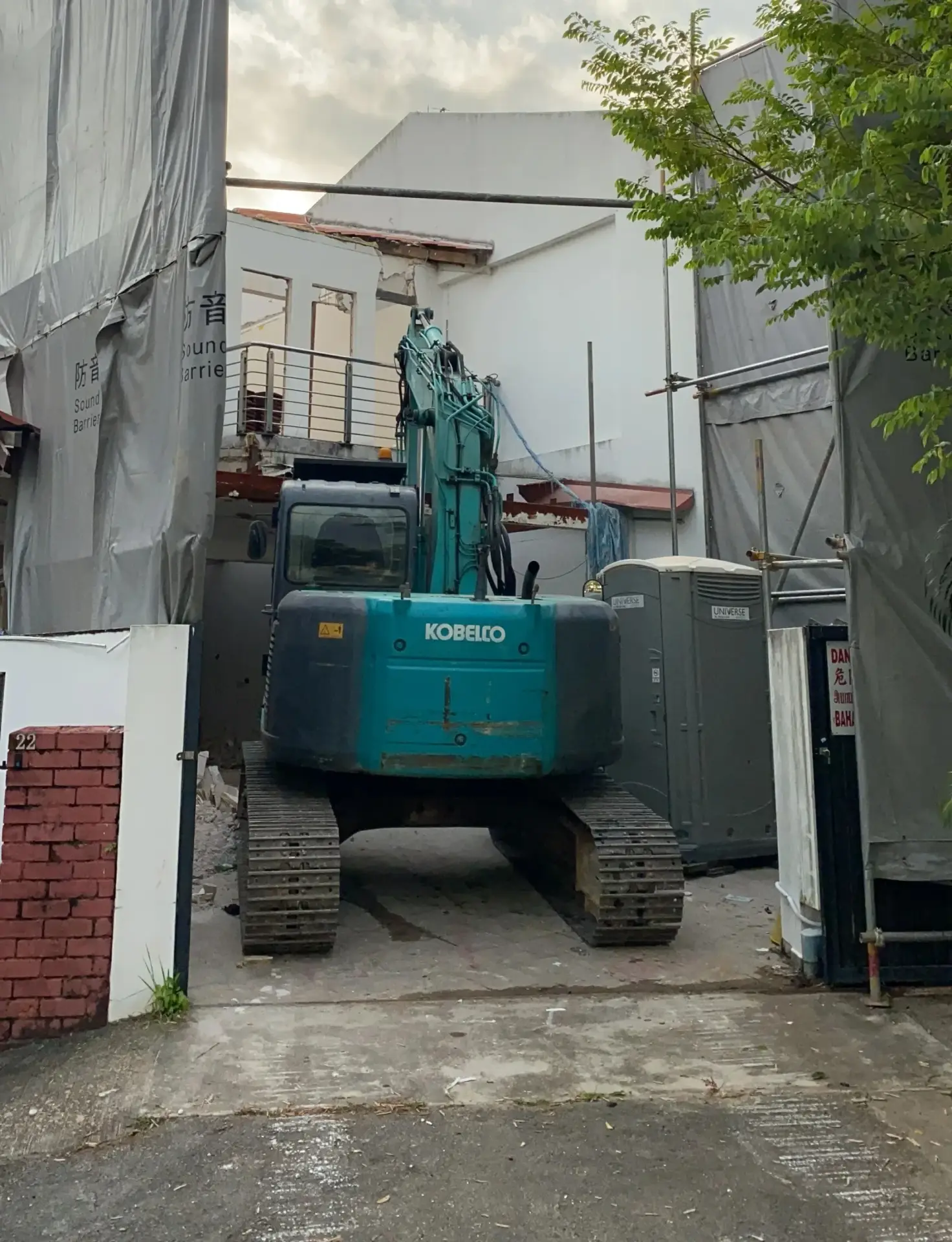Demolition and hacking project with excavator